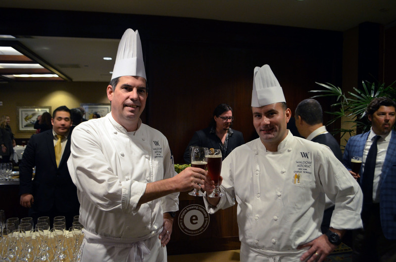 Executive Chef David Garcelon and Executive Pastry Chef Charlie Romano toast to a delicious event.