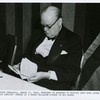 Winston Churchill prepares a speech at a Grand Ballroom Dinner in his honor