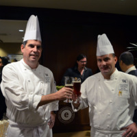 Executive Chef David Garcelon and Executive Pastry Chef Charlie Romano toast to a delicious event.